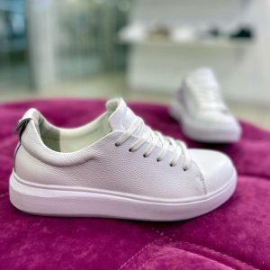 buy white women's sneakers made of soft leather in Kiev